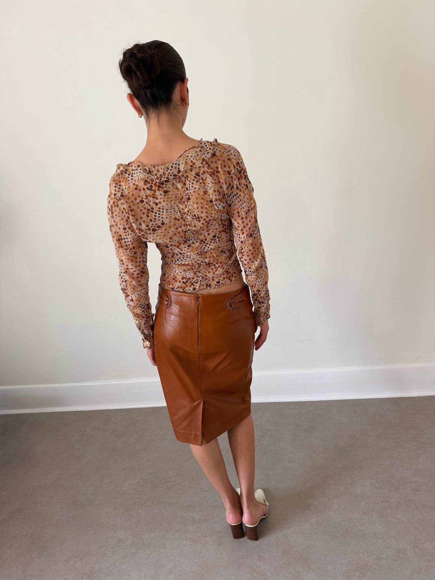 yves saint laurent fall 2002 by tom ford leather skirt