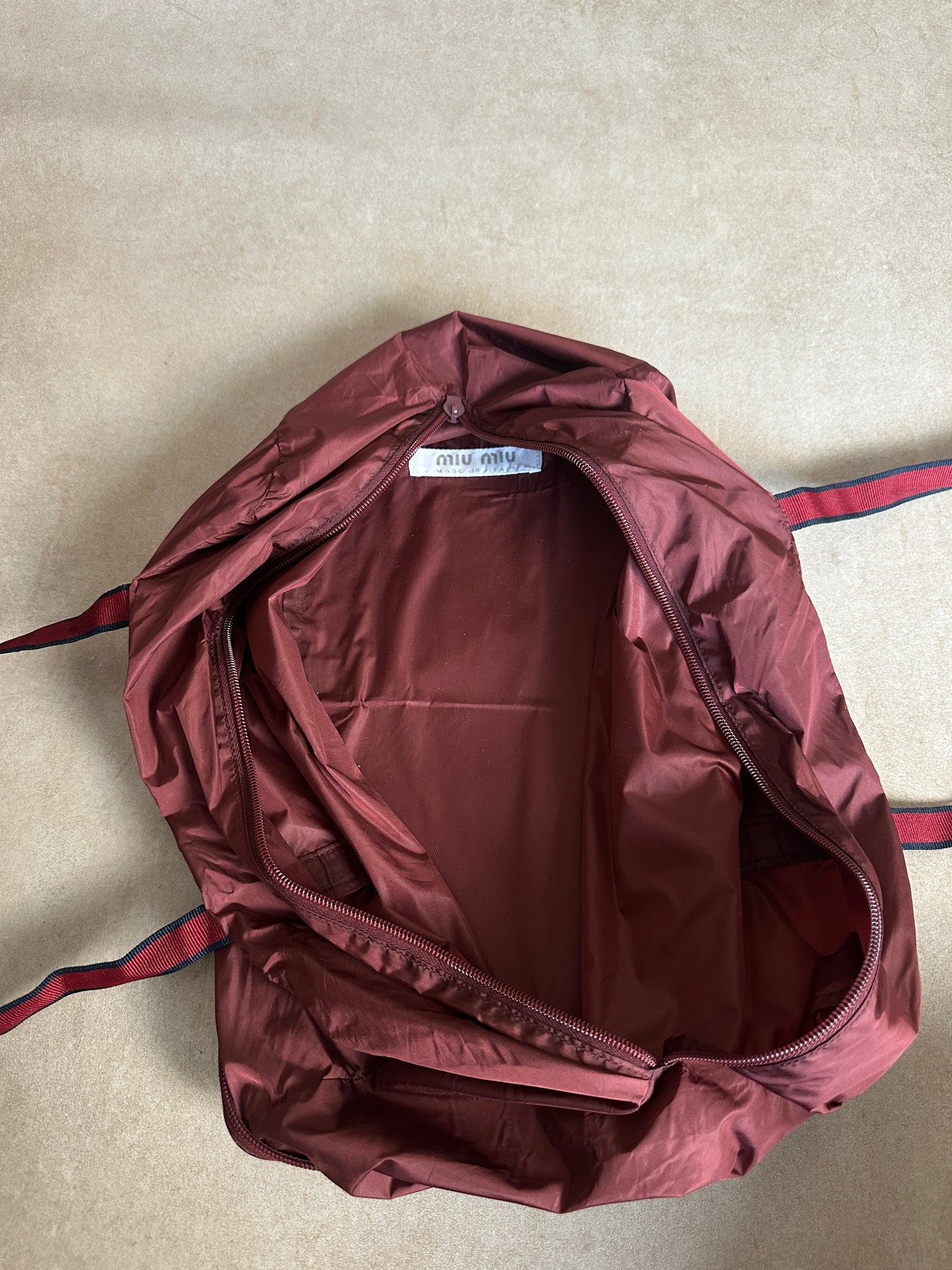 ss2000 miu miu burgundy foldable bag